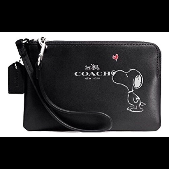 Coach Handbags - COACH SNOOPY LEATHER WRISTLET. LIMITED EDITION